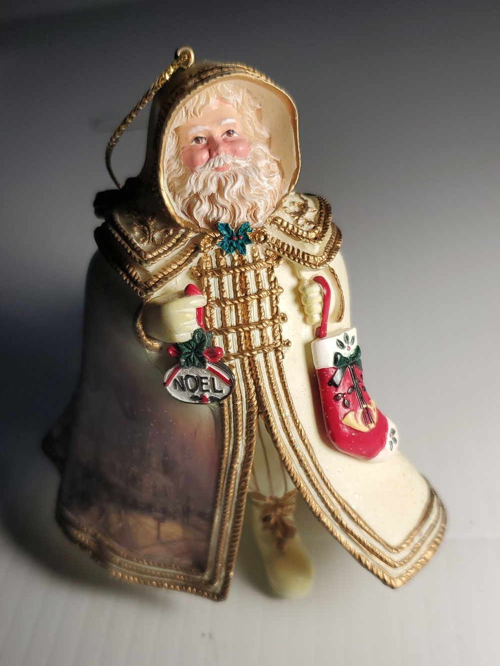 Thomas Kinkade Ivory and Gold Santa with Red Stocking Ornament 6